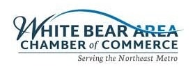 white_bear_chamber Logo of the White Bear Area Chamber of Commerce, featuring a blue wave design and the tagline Serving the Northeast Metro beneath the organization’s name in blue and gray text.